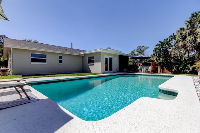 view of pool featuring a patio area and a fenced in pool