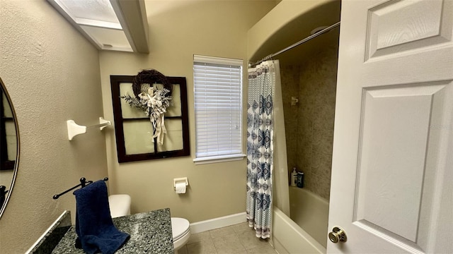 full bathroom featuring tile patterned flooring, toilet, shower / bathtub combination with curtain, and baseboards