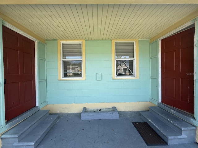 property entrance featuring covered porch