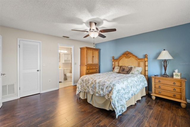 bedroom featuring a ceiling fan, visible vents, wood finished floors, baseboards, and a textured ceiling