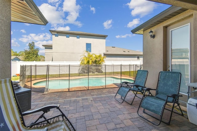 view of patio / terrace with a fenced in pool and a fenced backyard