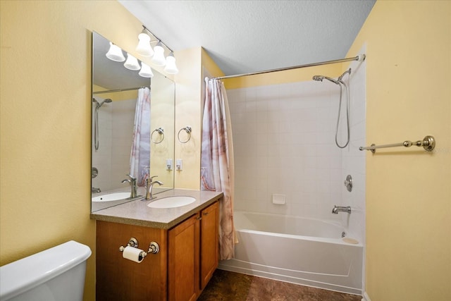 full bathroom featuring a textured ceiling, toilet, shower / tub combo, and vanity