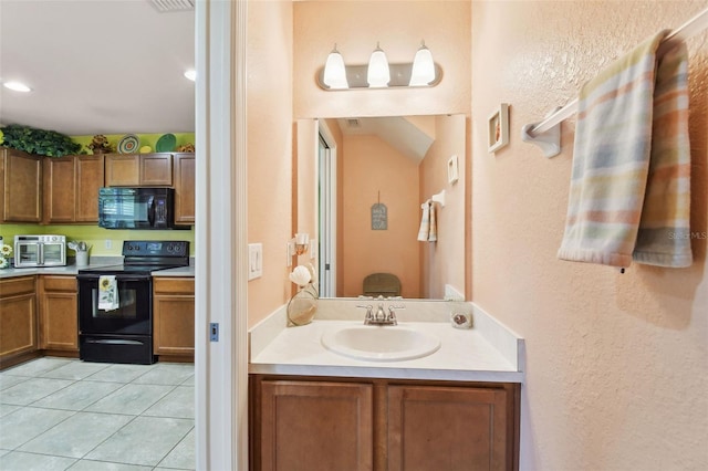 bathroom featuring vanity and tile patterned floors