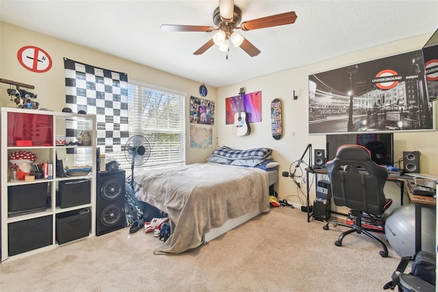 carpeted bedroom with ceiling fan