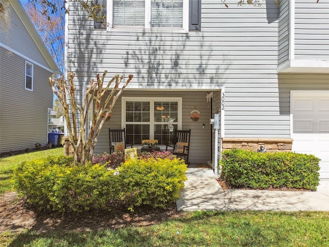 property entrance with a garage