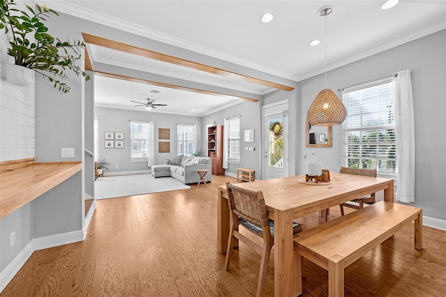 dining room with recessed lighting, baseboards, light wood-style flooring, and ornamental molding