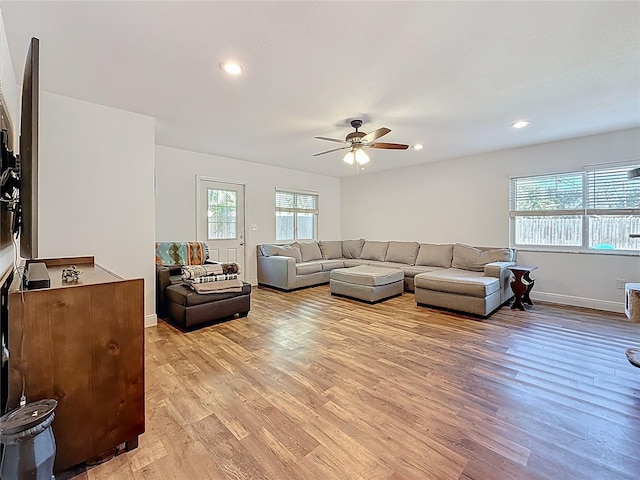 living area featuring recessed lighting, light wood-style flooring, baseboards, and a ceiling fan