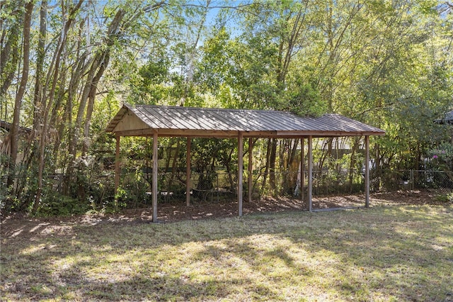 surrounding community with a yard and fence