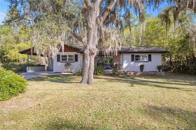 view of front of home with a front yard