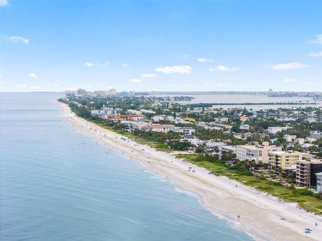 aerial view with a city view, a beach view, and a water view