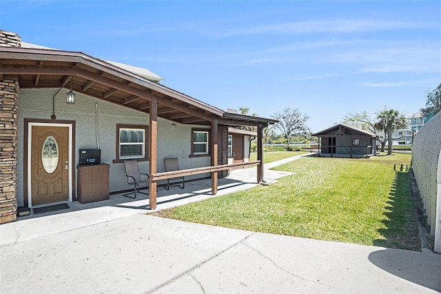 view of yard featuring covered porch