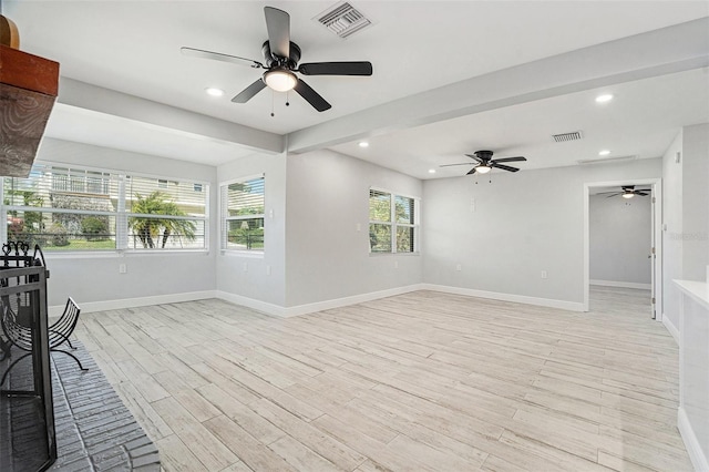 empty room featuring recessed lighting, visible vents, baseboards, and light wood-style flooring