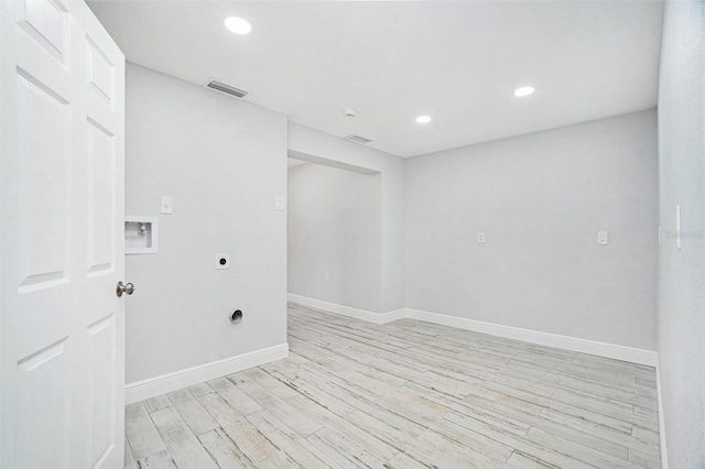 washroom featuring visible vents, hookup for an electric dryer, recessed lighting, washer hookup, and light wood-type flooring