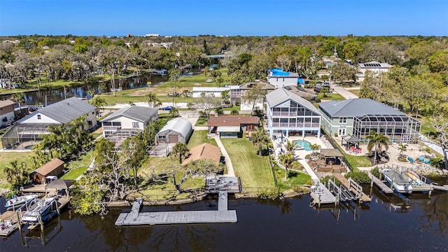 aerial view featuring a water view and a residential view