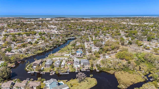 aerial view featuring a residential view and a water view