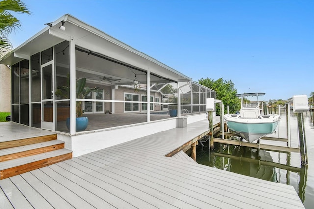 view of dock with a water view and boat lift