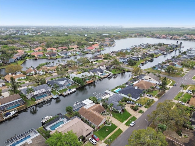 aerial view featuring a residential view and a water view