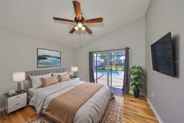 bedroom with a ceiling fan, baseboards, light wood finished floors, lofted ceiling, and access to outside