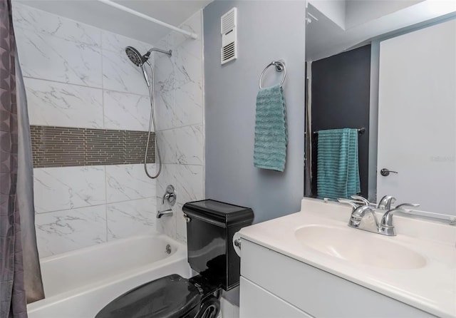 full bathroom with vanity, toilet, visible vents, and shower / bath combo