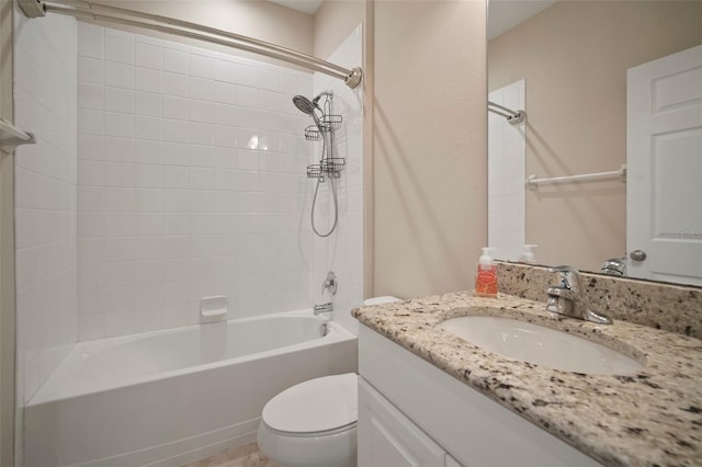 bathroom with vanity, toilet, and washtub / shower combination