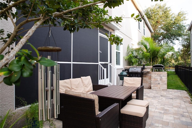 view of patio featuring area for grilling, a fenced backyard, and grilling area