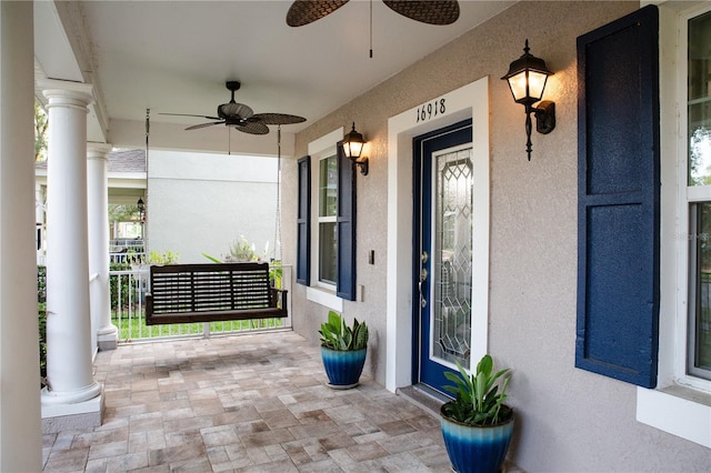 view of patio / terrace with a porch and a ceiling fan