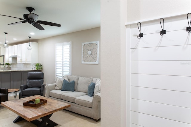 living room featuring recessed lighting and ceiling fan