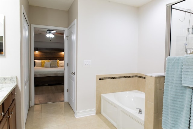 full bath with tile patterned flooring, ensuite bath, a stall shower, a bath, and vanity