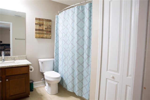 bathroom featuring tile patterned floors, toilet, vanity, and a shower with curtain