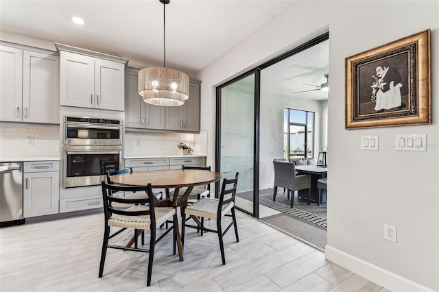 dining room with ceiling fan, baseboards, light wood-style flooring, and recessed lighting