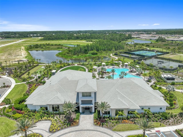 birds eye view of property with a water view