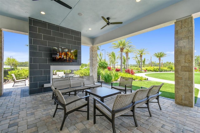 view of patio / terrace with outdoor lounge area and ceiling fan