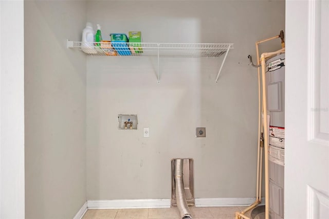 laundry room featuring light tile patterned floors, baseboards, hookup for an electric dryer, laundry area, and washer hookup