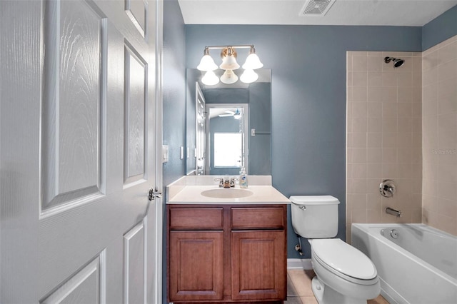 bathroom with visible vents, toilet, shower / tub combination, ceiling fan, and vanity