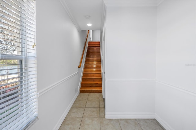 stairs with recessed lighting, baseboards, crown molding, and tile patterned flooring