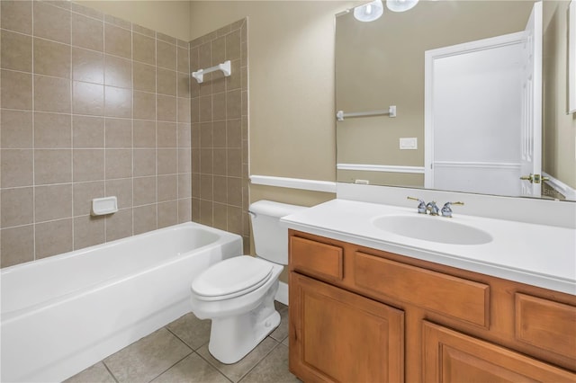 full bathroom featuring toilet,  shower combination, vanity, and tile patterned flooring