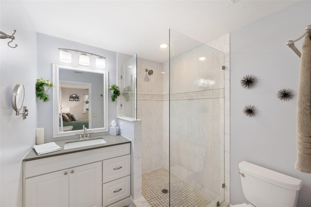 bathroom with vanity, ensuite bath, toilet, and a stall shower