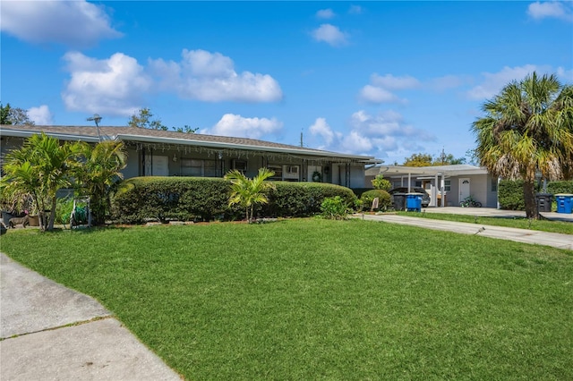 ranch-style house with a front lawn