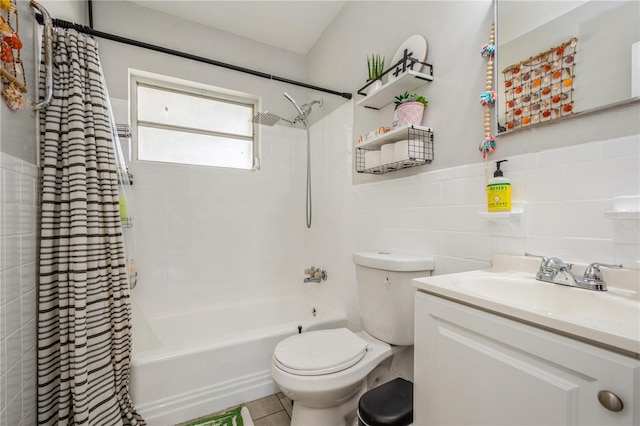 full bath featuring vanity, tile walls, shower / bath combination with curtain, and toilet