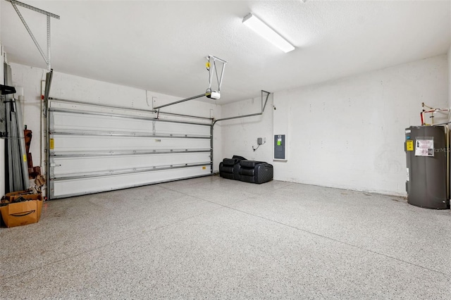 garage featuring electric panel and electric water heater