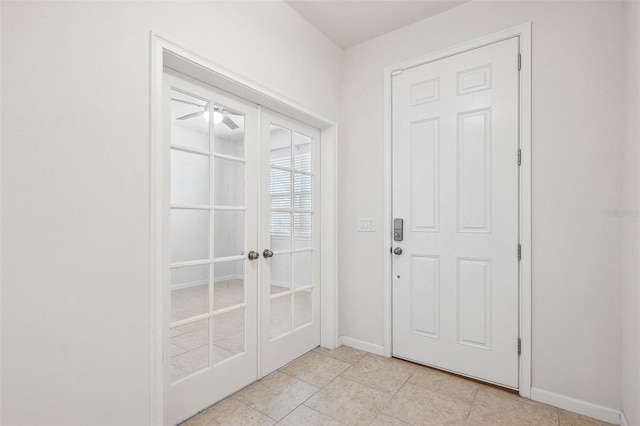 13001 Satin Lily Dr, Riverview, FL 33579 - entryway featuring light tile patterned floors, french doors, baseboards, and a ceiling fan