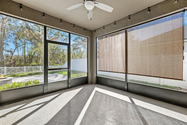 13001 Satin Lily Dr, Riverview, FL 33579 - unfurnished sunroom featuring ceiling fan and rail lighting