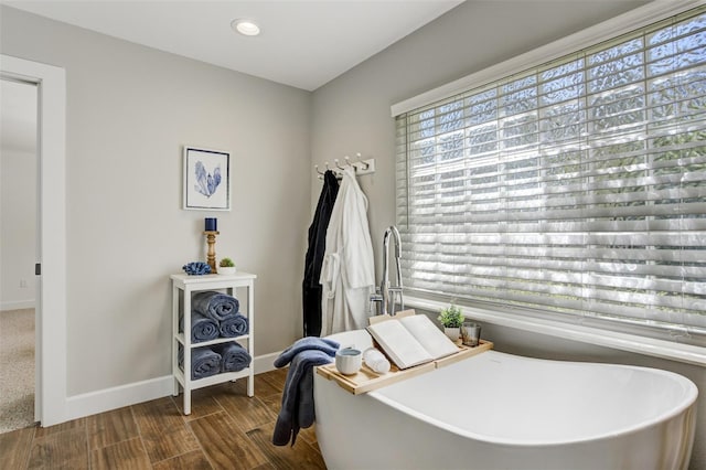 bedroom featuring recessed lighting, baseboards, and wood finished floors