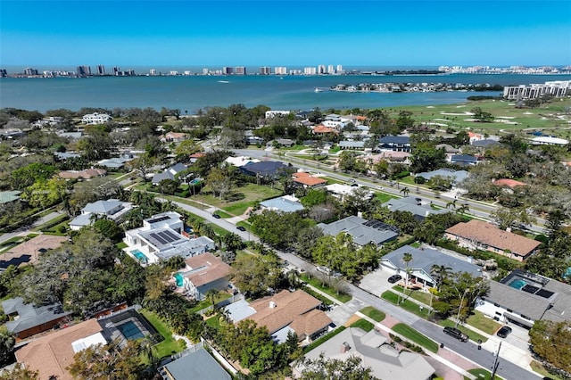 aerial view with a water view and a residential view