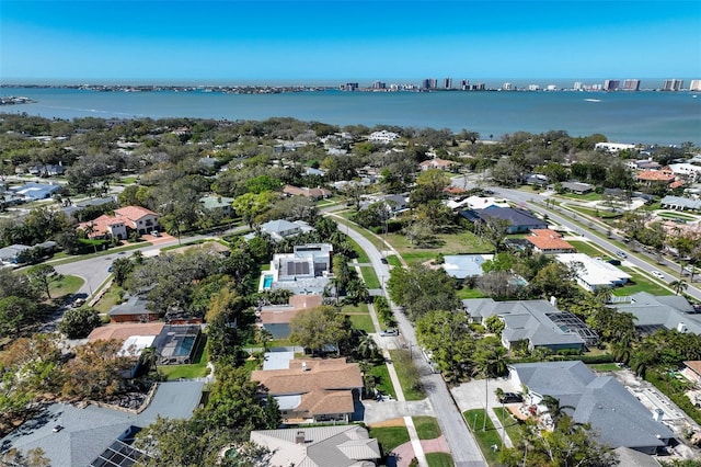 aerial view featuring a residential view and a water view