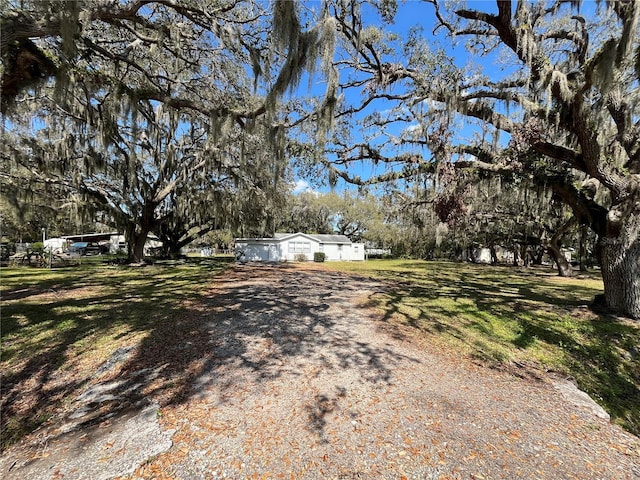 exterior space with a front lawn