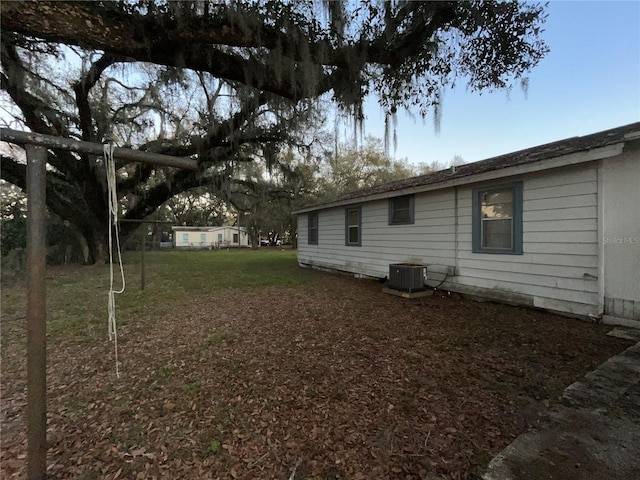 view of yard featuring central AC