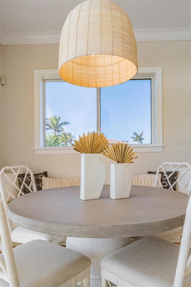 dining room with ornamental molding