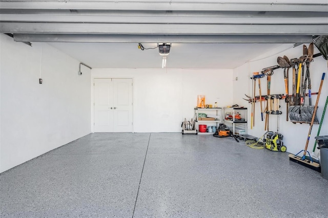 garage featuring a garage door opener