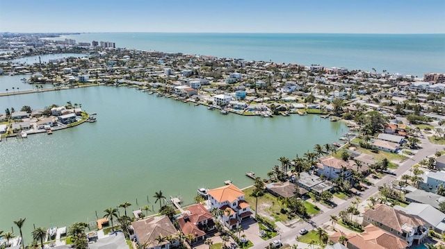 birds eye view of property featuring a residential view and a water view